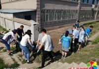園新社區開展“美化居住環境  助力創城”志愿服務活動